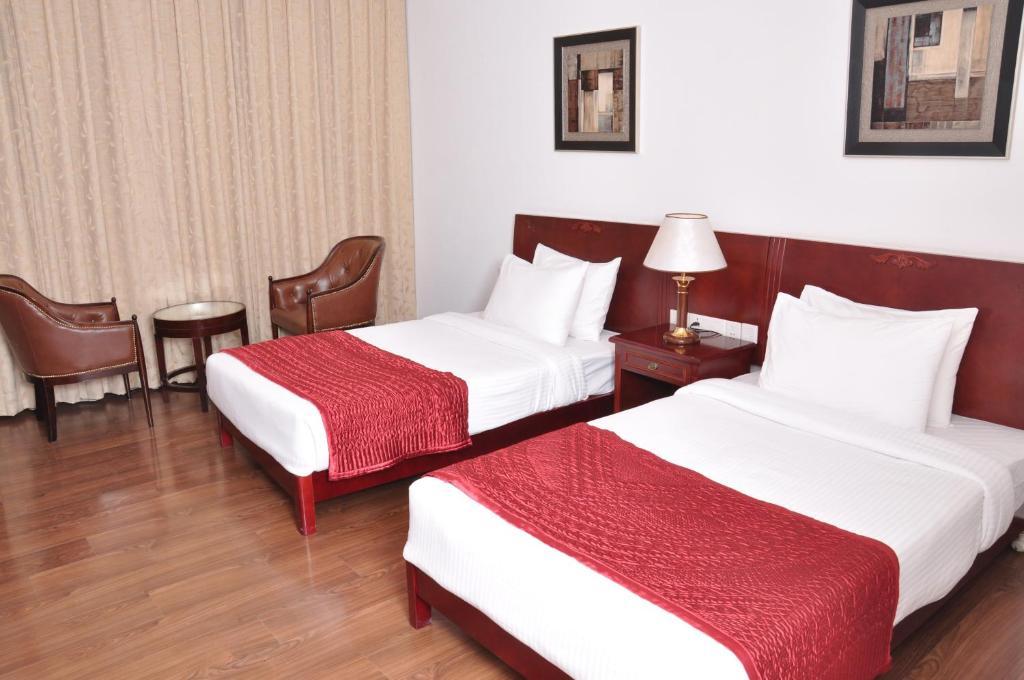 Lilywhite Hotel Új-Delhi Szoba fotó
